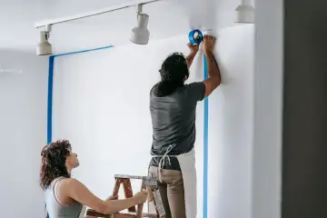 A painter on the Prestige Painting crew at work